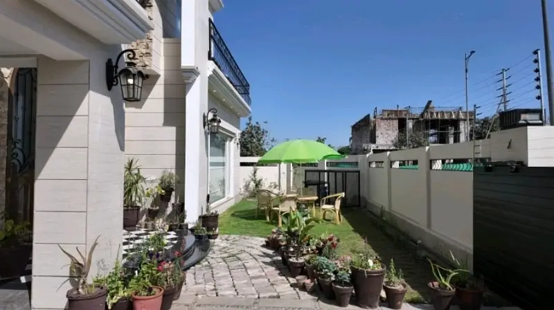 Immaculate Corner 20 Marla House Near To Park With Super Solid Construction Lift And Hybrid Solar System Situated At Elite Neighborhood Of L Block Phase 6 DHA Lahore